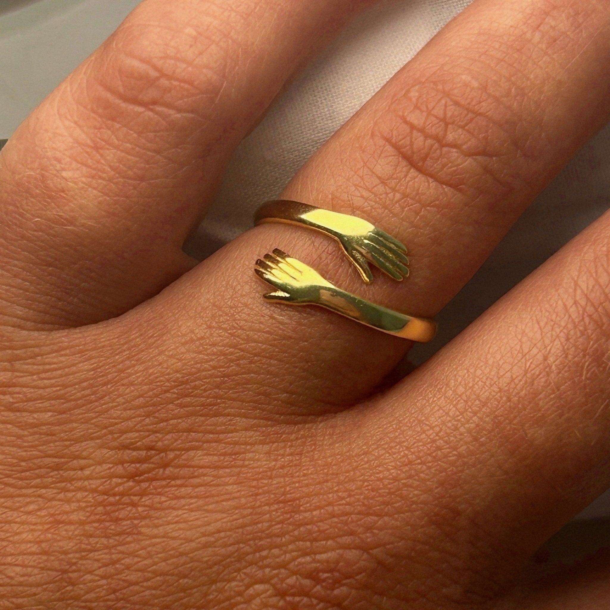 Ring Umarmung Gold Silber